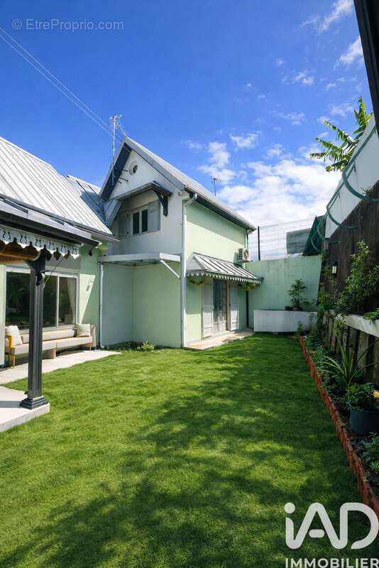 Photo 2 - Maison à SAINT-ANDRE