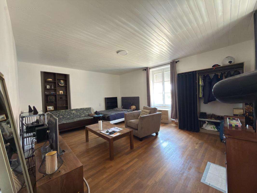 Maison en pierre avec 350 m² de dépendances, jardin et terrasse – Genevrières (52) - photo 16
