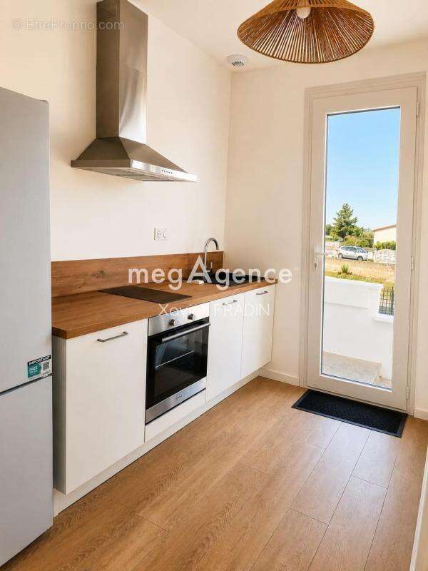 Appartement entièrement rénové avec sous-sol de 48 m² – Stationnement privatif - photo 2