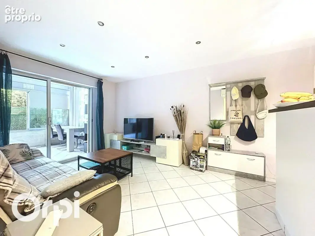 Appartement 2 pieces 35 m² + stationnement + cave + jardin + veranda 14 m² + piscine - photo 10