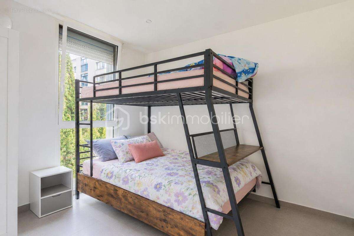 Appartement T3 en rez-de jardin avec loggia - photo 10