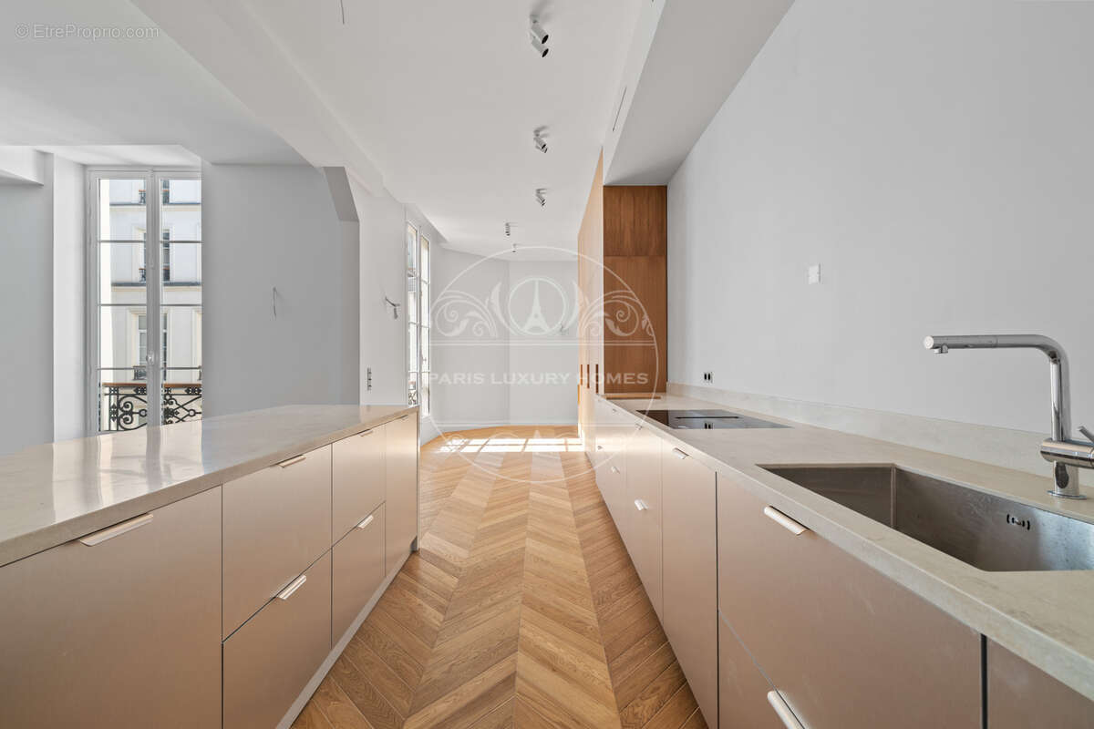 Superbe appartement rénové à Paris 1er ! - photo 5