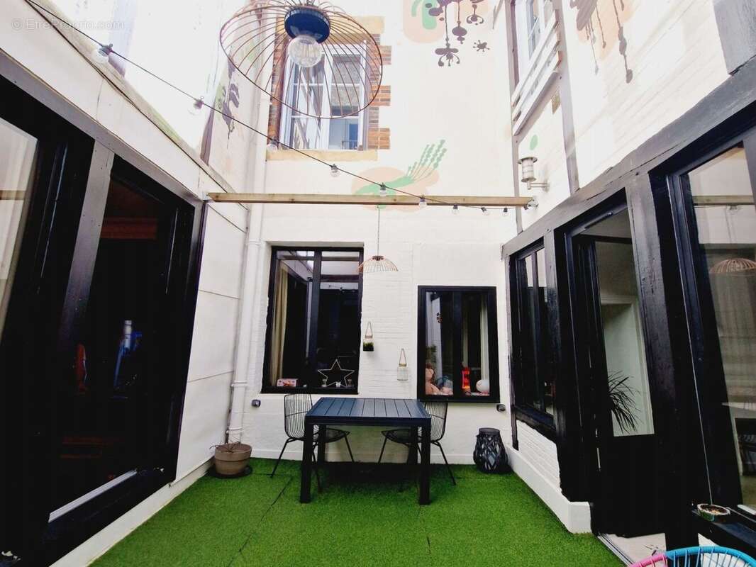 F5 rénové avec patio - photo 11