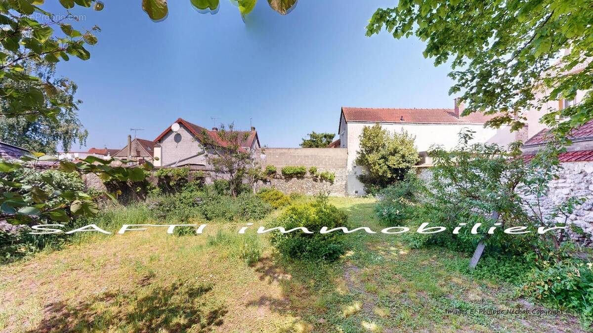 Photo 1 - Terrain à BONNIERES-SUR-SEINE