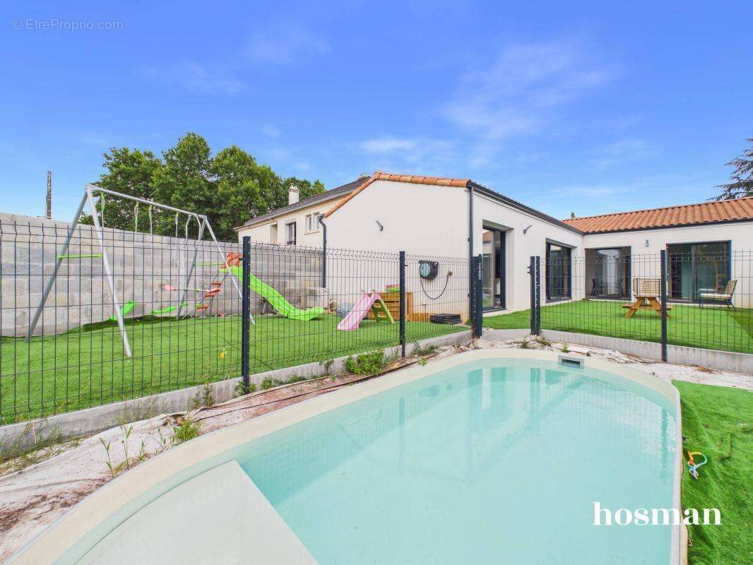 Belle maison de plain-pied avec 4 chambres avec jardin et piscine - En impasse, aux Sorinières - photo 16