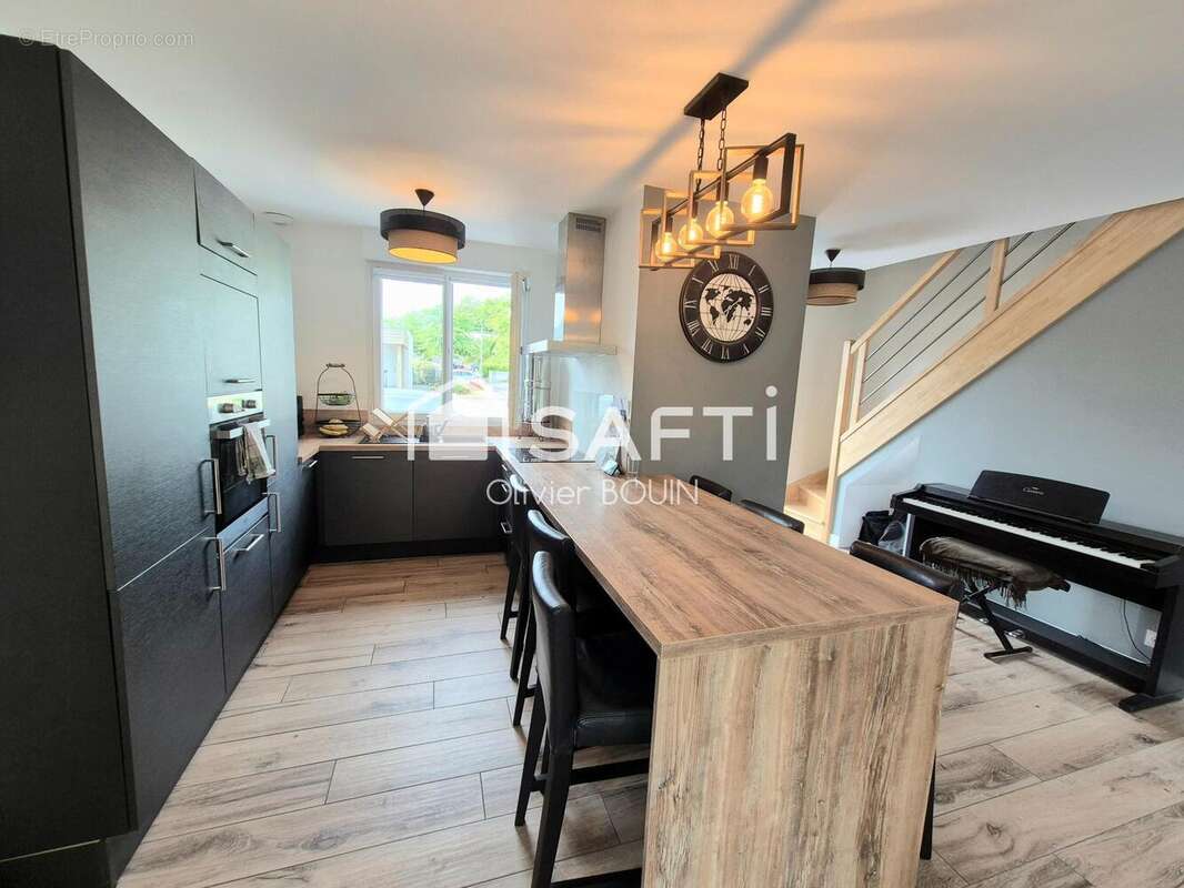 Photo 5 - Maison à LANDIVISIAU