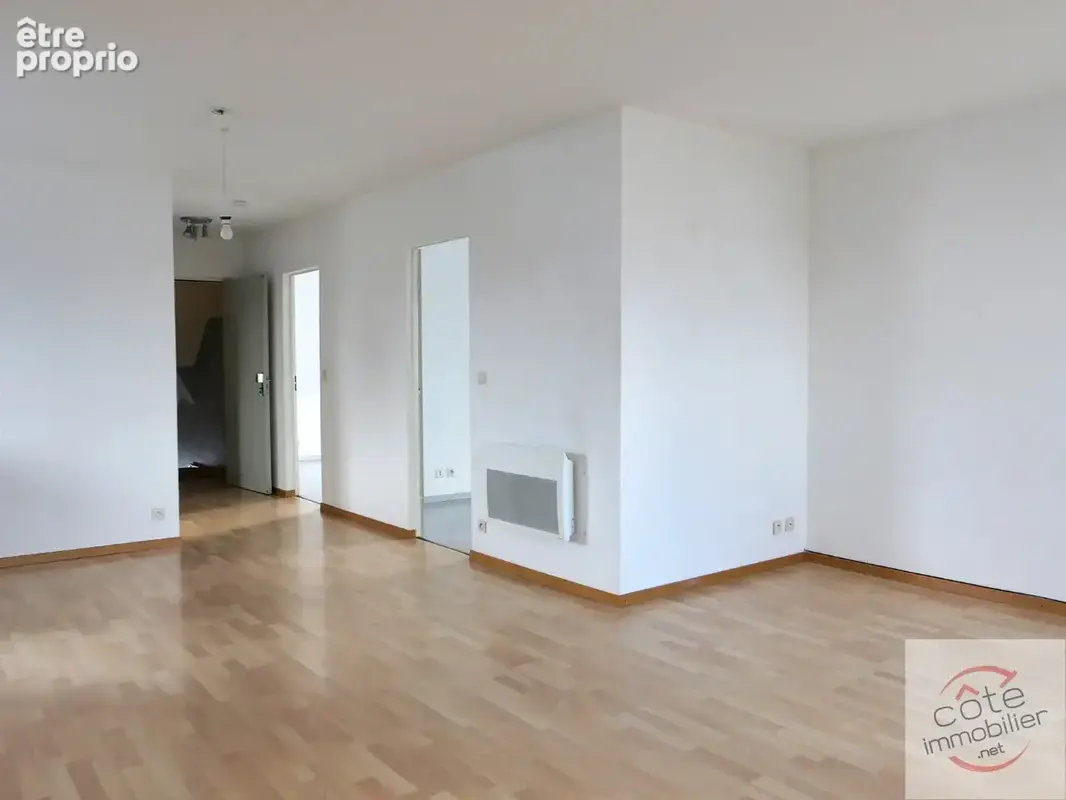 Appartement sous combles dans maison individuelle comprenant trois appartements - photo 4