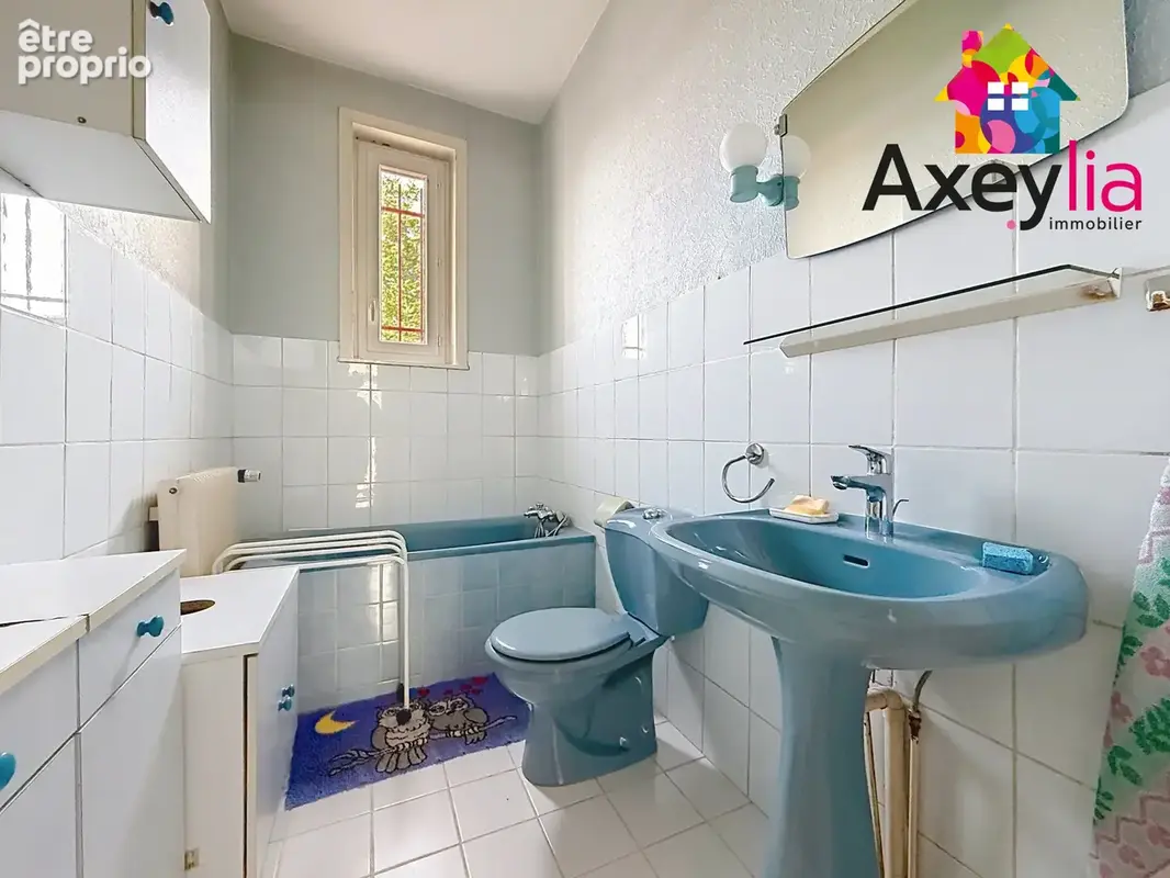 A vendre - riorges - maison élevée sur sous-sol avec deux chambres, garage, terrasse et terrain - photo 10
