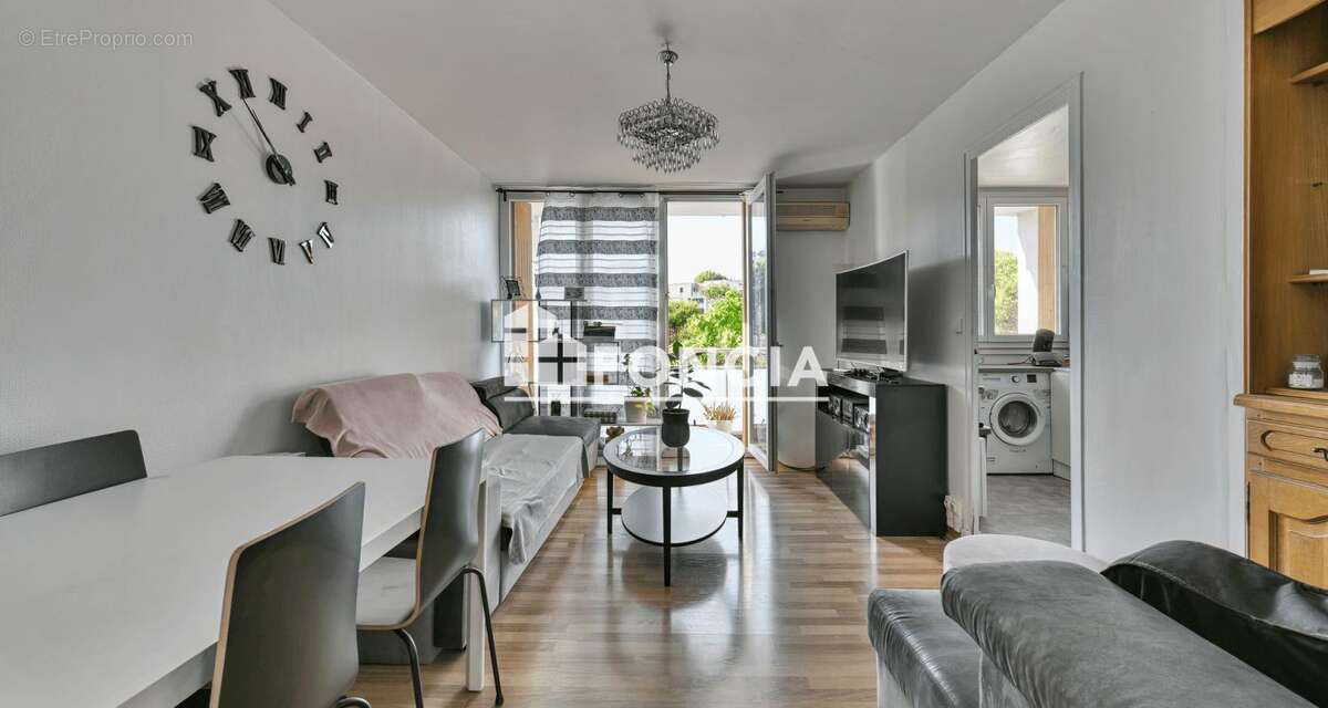 À vendre – Appartement T2 traversant de 52 m² avec terrasse, garage, cave et locataire en place - photo 2