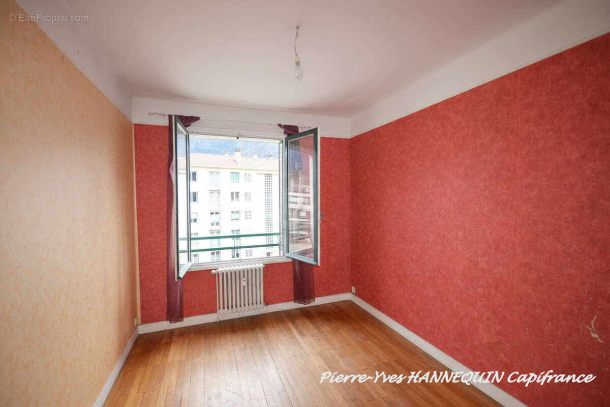 Appartement T4 de 96 m² avec beaux volumes – Quartier prisé proche centre-ville ALBERTVILLE (73) - photo 12