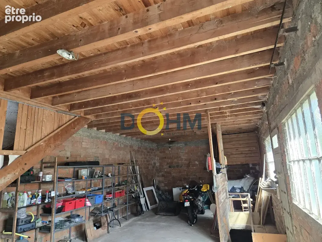 Ensemble immobilier avec une maison habitation a renover + un garage 70 m2 - photo 3