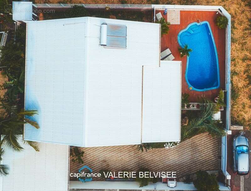 Villa familiale f5 avec piscine, vue dégagée et superbes volumes – saint-louis - photo 18