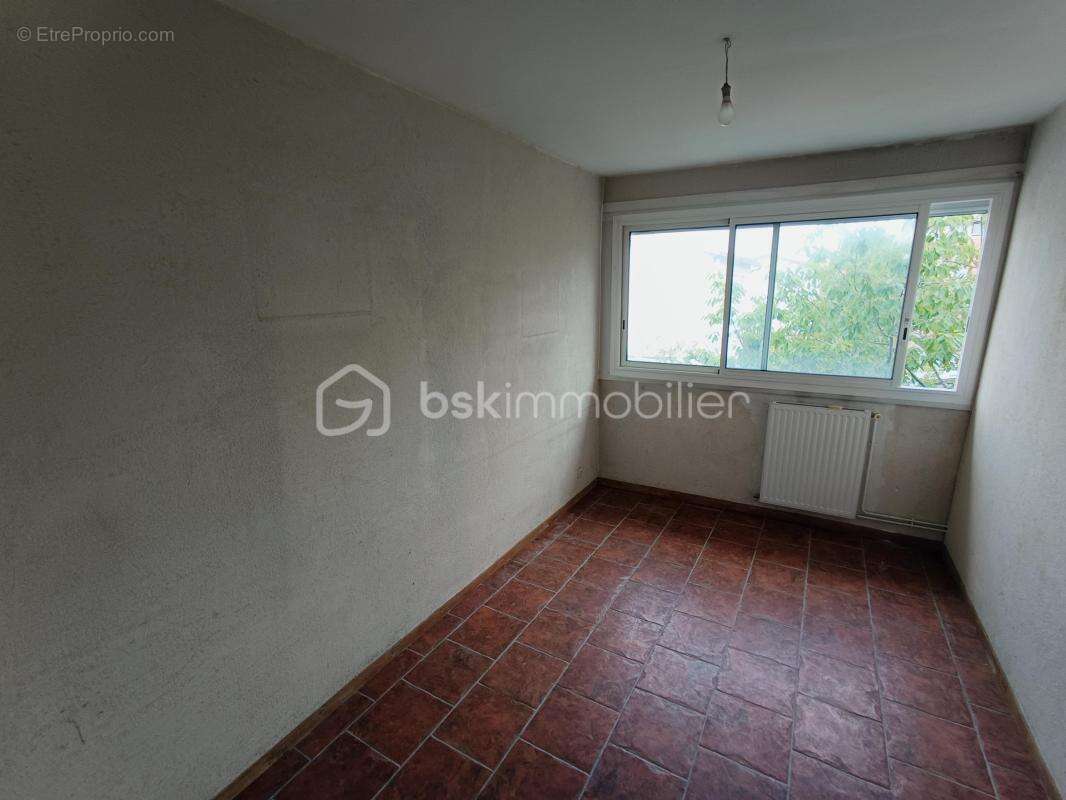 Secteur El Hogar - Maison de 107 m² avec jardin et garage, 4 chambres et fort potentiel - photo 12