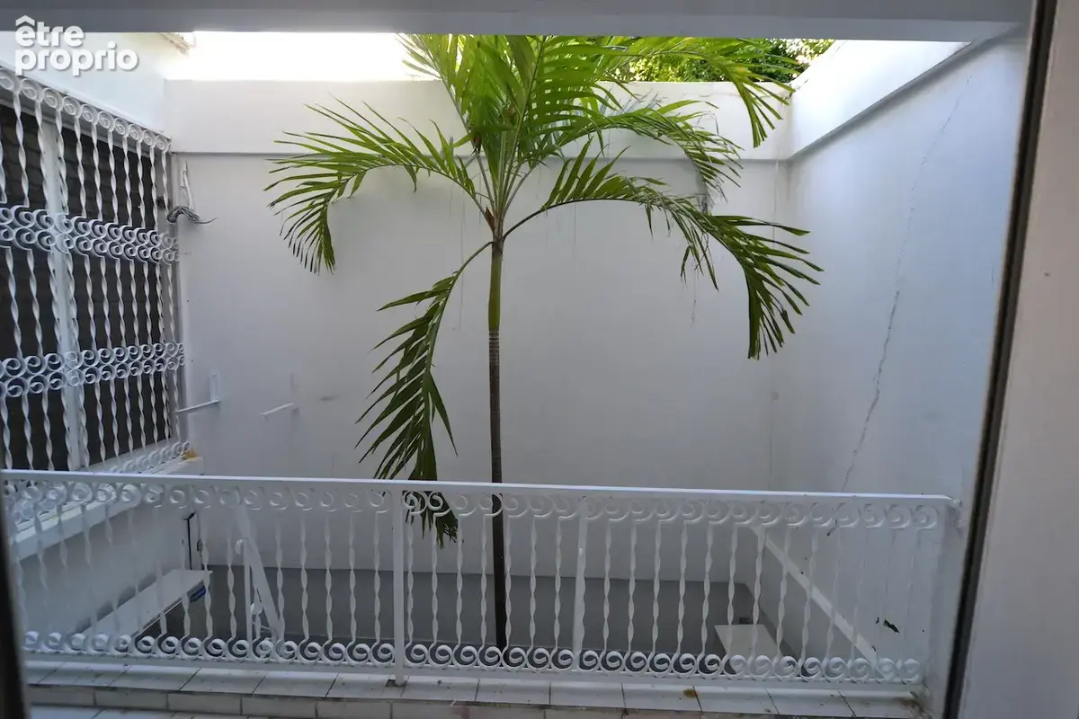 Appartement T4, très bon état, beaux volumes centre ville - photo 7