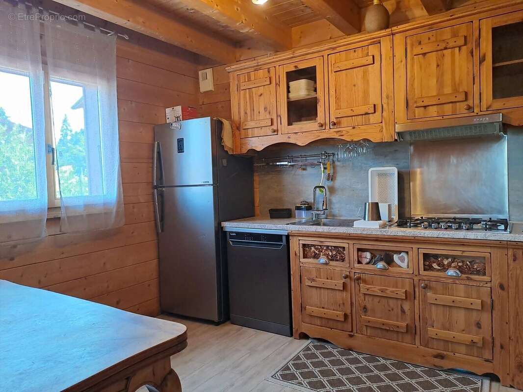 PREMANON : Chalet avec 2 logements et grand garge - photo 7