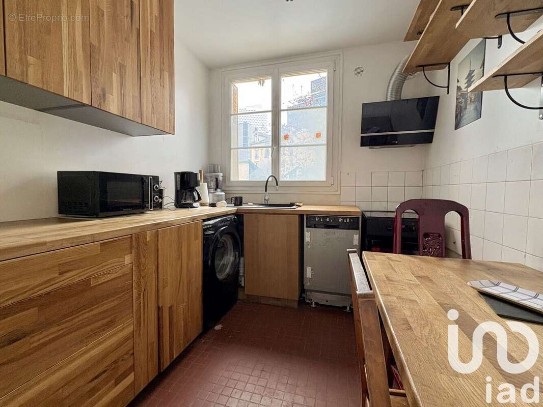 Photo 4 - Appartement à COURBEVOIE