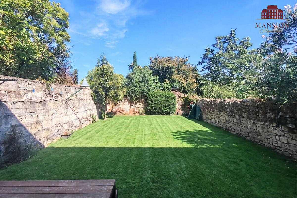 VENDU LIBRE - Appartement avec jardin - photo 2