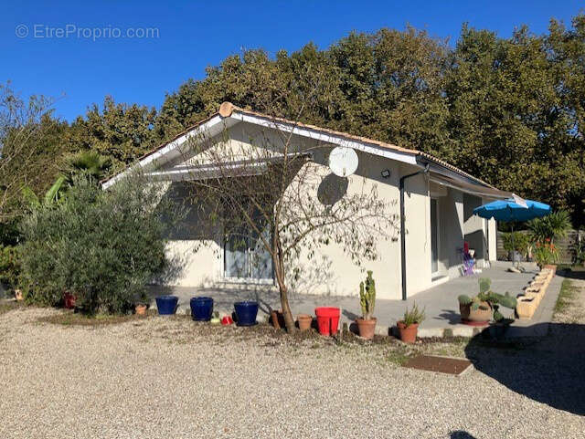 Au coeur d'un jardin paysagé en bordure de zone naturelle maison 3 ch possibilité 4 à 15 minutes de l'océan - photo 10
