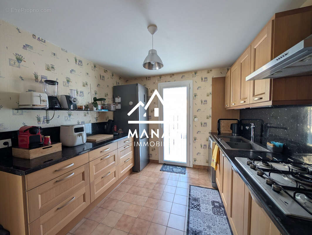 Cuisine avec accès au jardin - Maison à NEFIACH