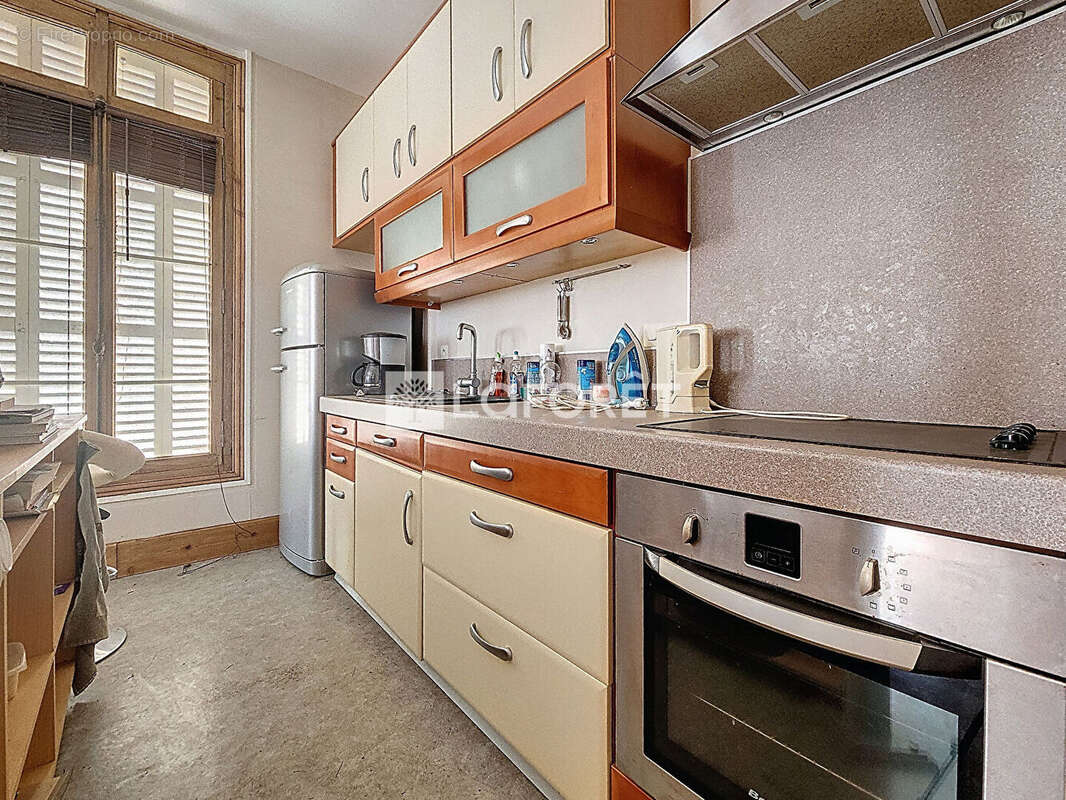Appartement T2 - 48 m2 - proche champ de foire - photo 5