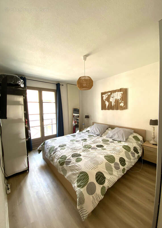 SOUS COMPROMIS : Centre-ville : T3 de 72 m2 avec terrasse et parking privatif - photo 7