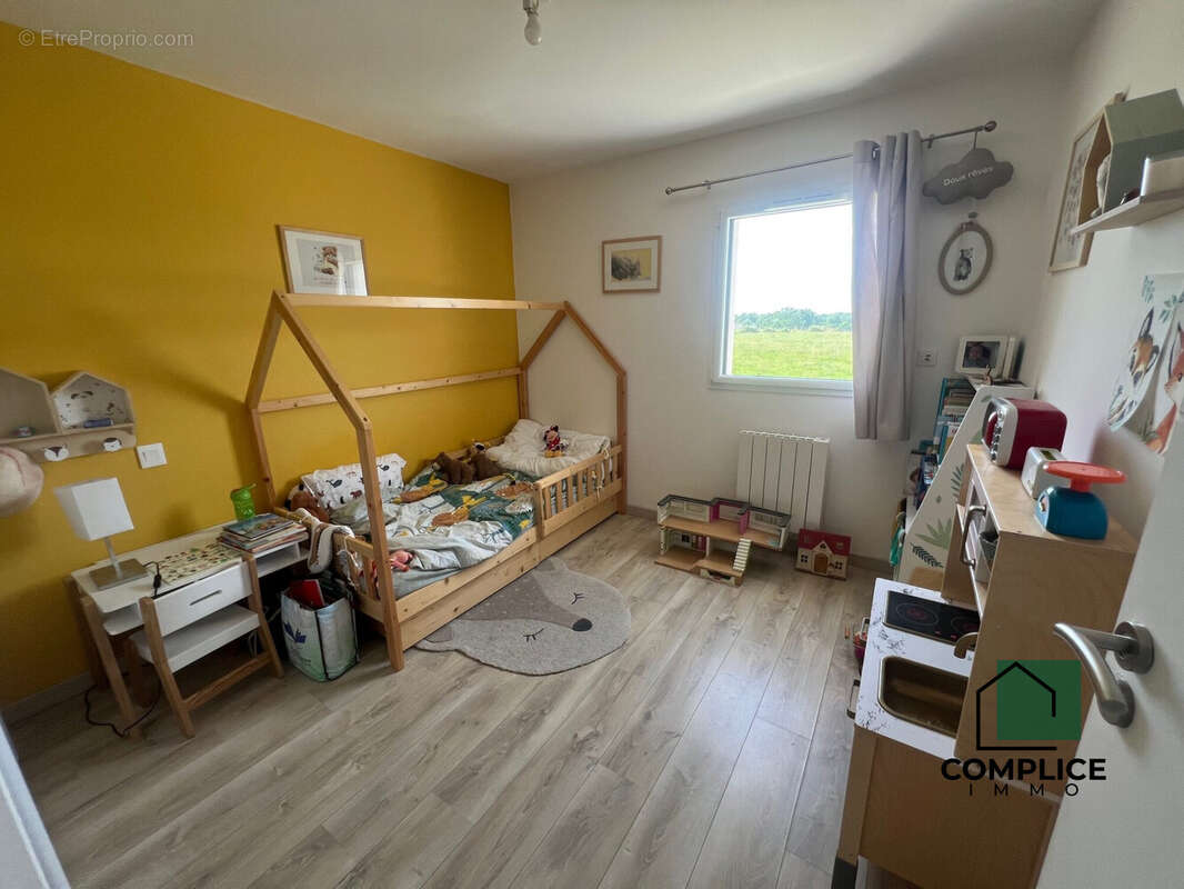Maison 90 m² à Saint-Etienne-De-Montluc  - photo 9