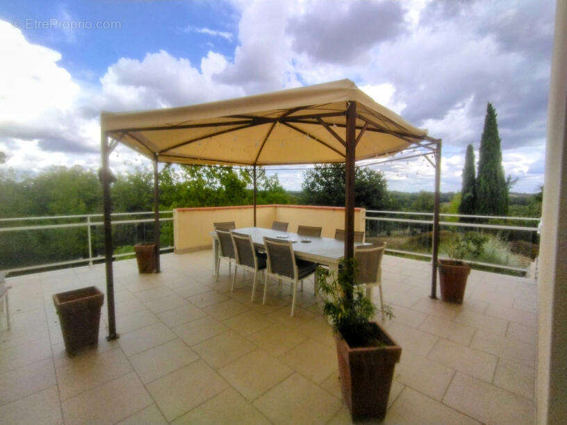 terrasse - Maison à CASTELNAU-MONTRATIER