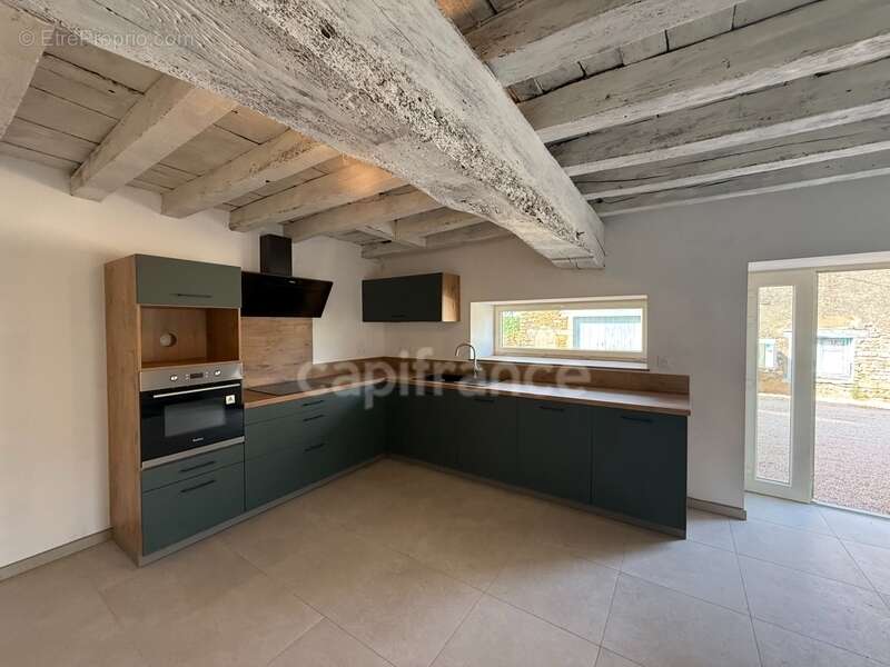 Le charme de l’ancien, le confort du moderne – Maison rénovée de 124 m² à Saint-Maurice-de-Satonnay - photo 5