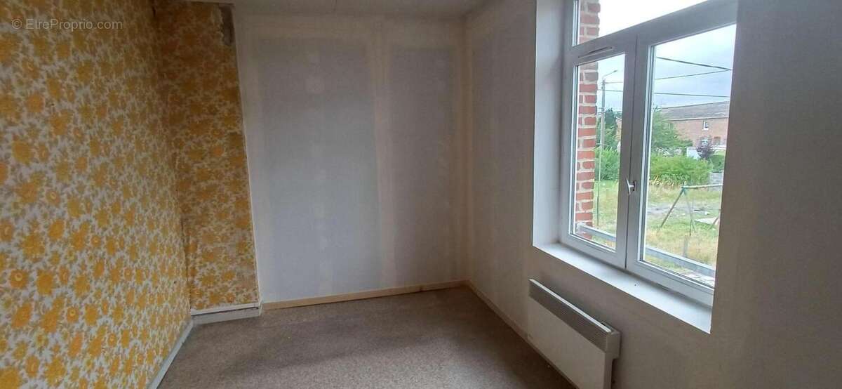 Maison à OSTRICOURT