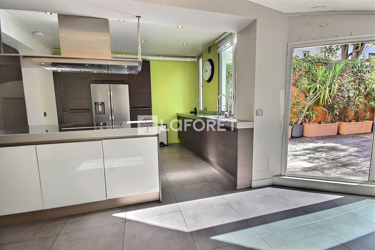 Maison à COURBEVOIE