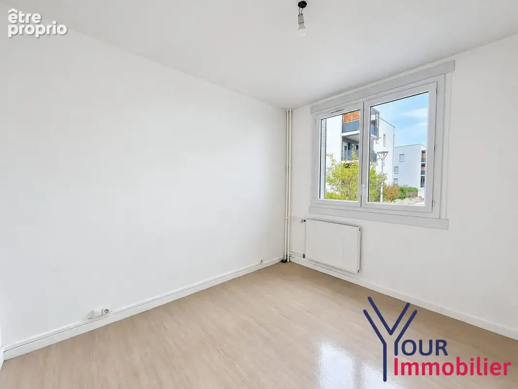 Appartement 4 pièces 87 m² à vendre à Decines-Charpieu (69150) - photo 7