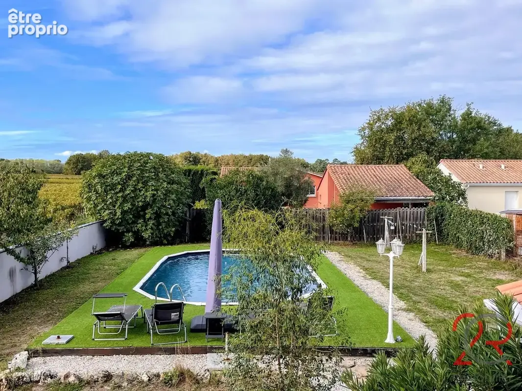 Maison aux beaux volumes avec 4 chambres, garage et piscine - photo 16