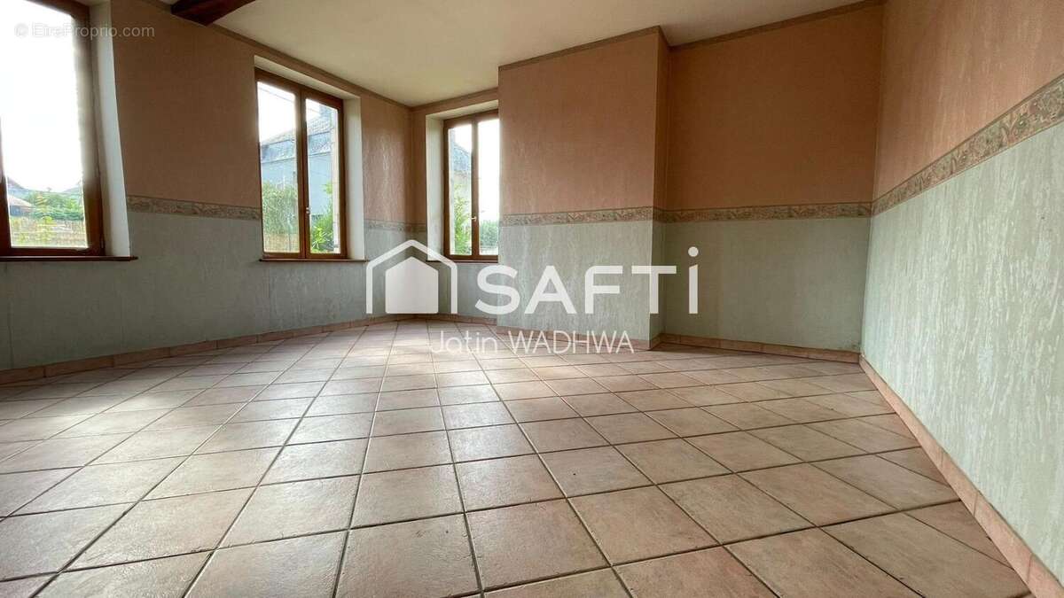 Photo 2 - Maison à RENNEVILLE