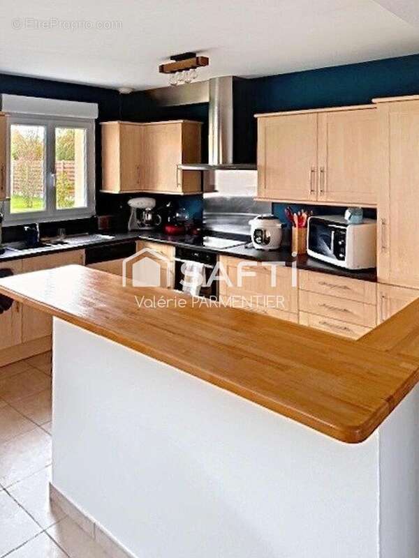 Photo 2 - Maison à RANG-DU-FLIERS