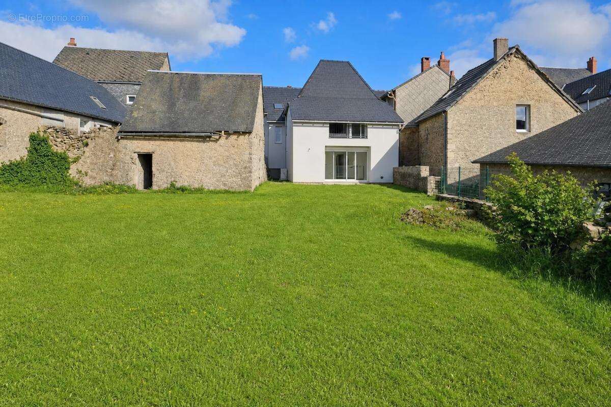 Immeuble rénové loué avec jardin à Château-Chinon - photo 2