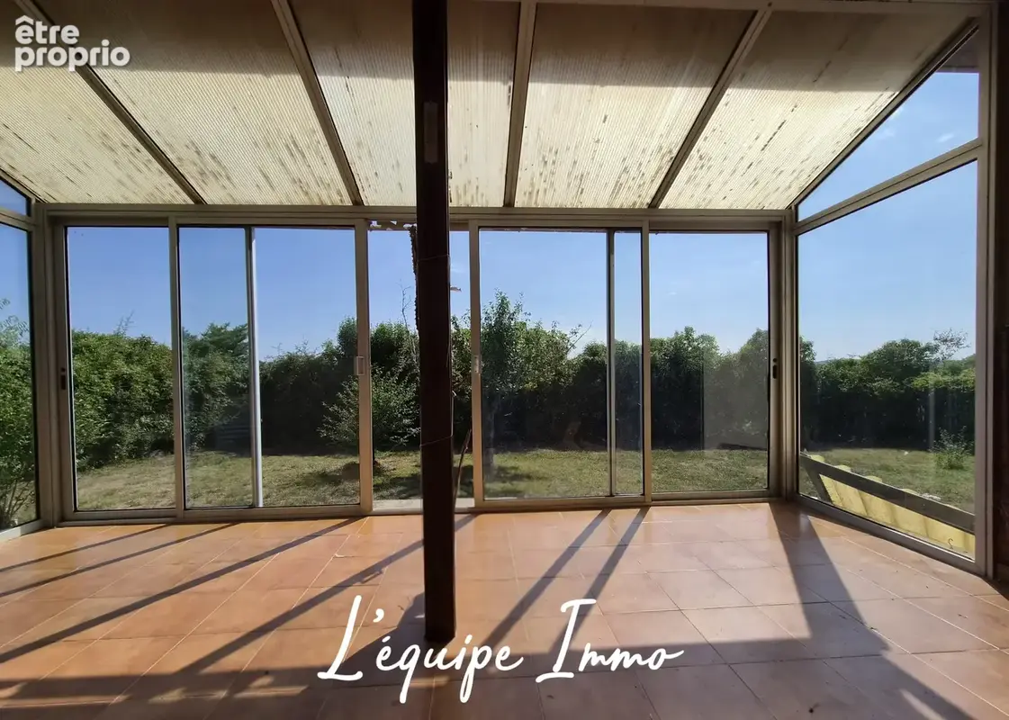 Maison de plain-pied comprenant 2 chambres, vérandas, garage et jardin - photo 7