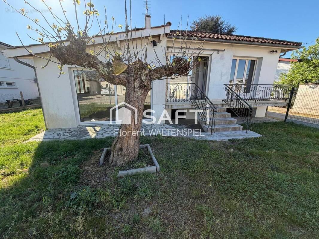 Photo 1 - Maison à CADILLAC