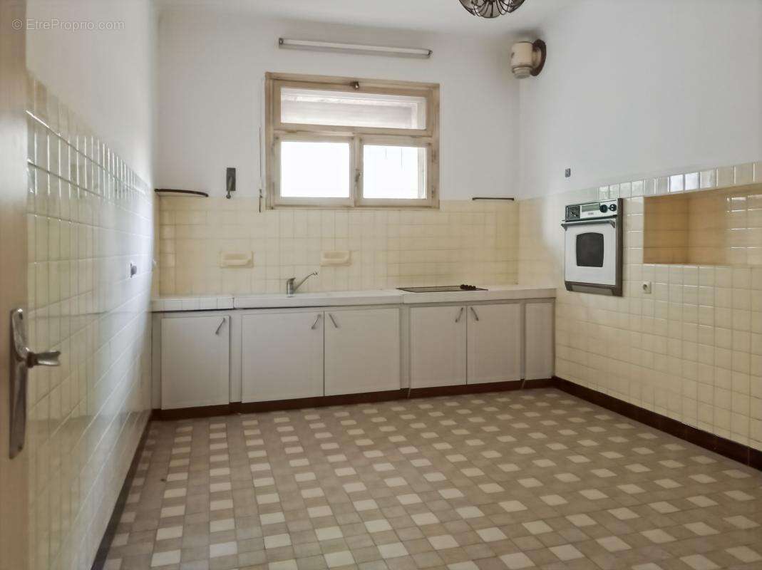 Maison à LAUDUN-L'ARDOISE