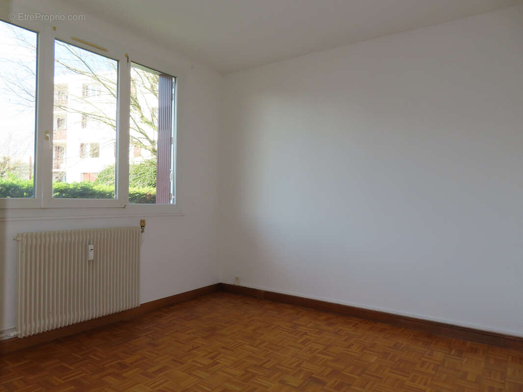 Appartement T3 avec jardin, cave et parking - photo 8