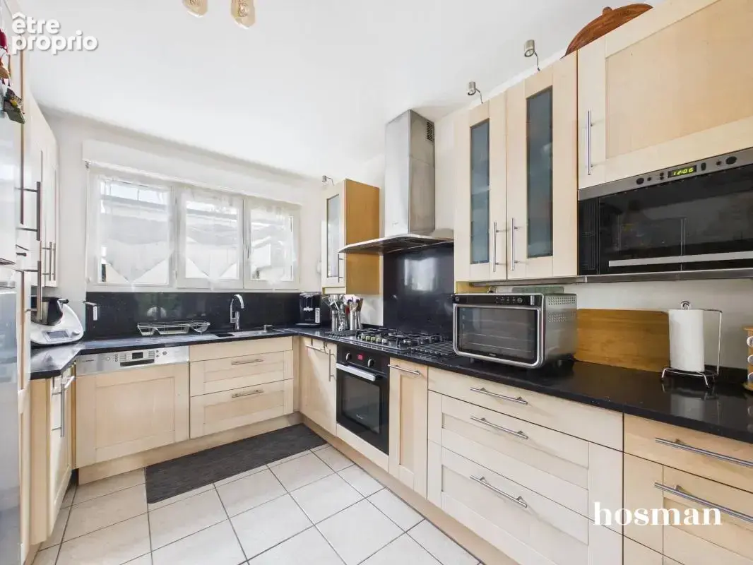 Maison mitoyenne 5 pièces de 101 m² avec jardin et terrasse, place de parking et garage à Bron centre - photo 7