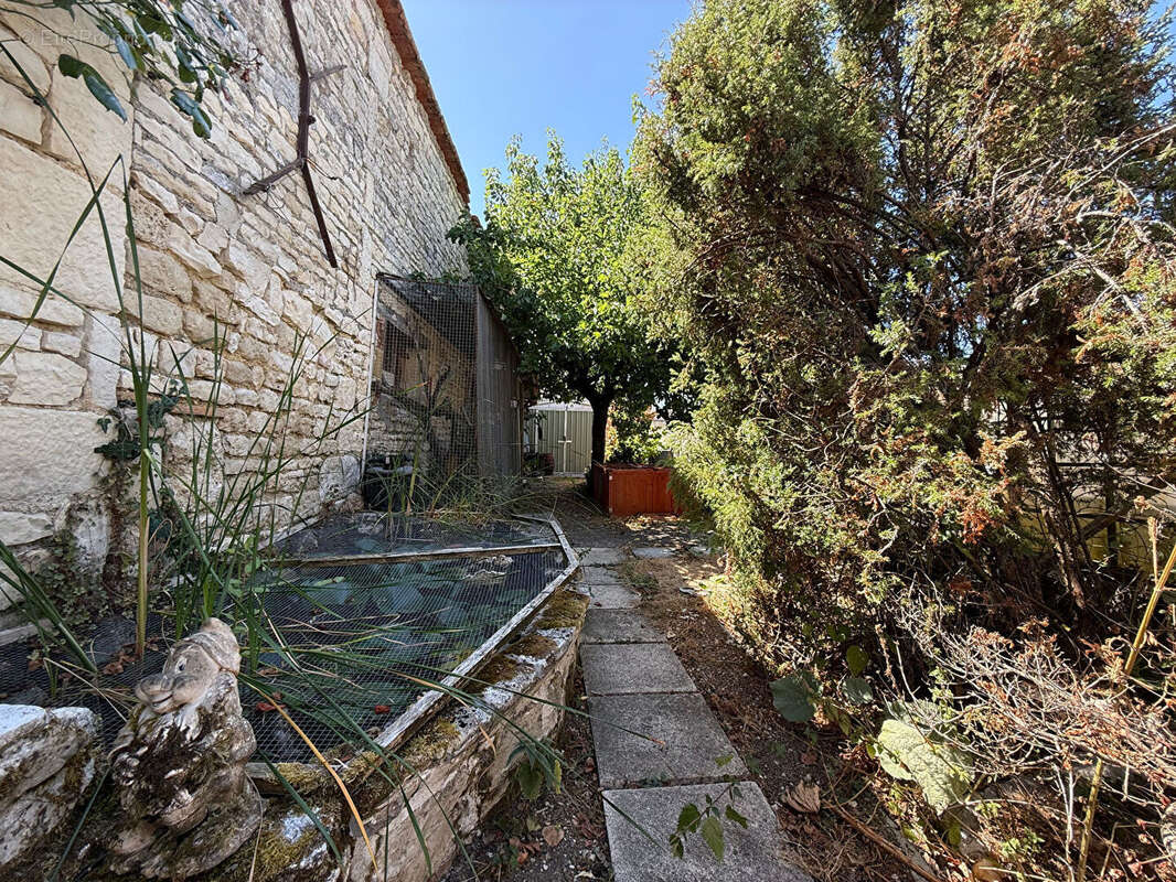 Maison 55m² à villeneuve-la-comtesse - photo 12