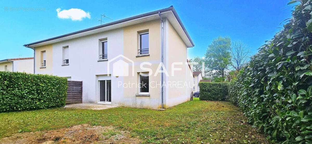 Photo 1 - Maison à TERRASSON-LAVILLEDIEU