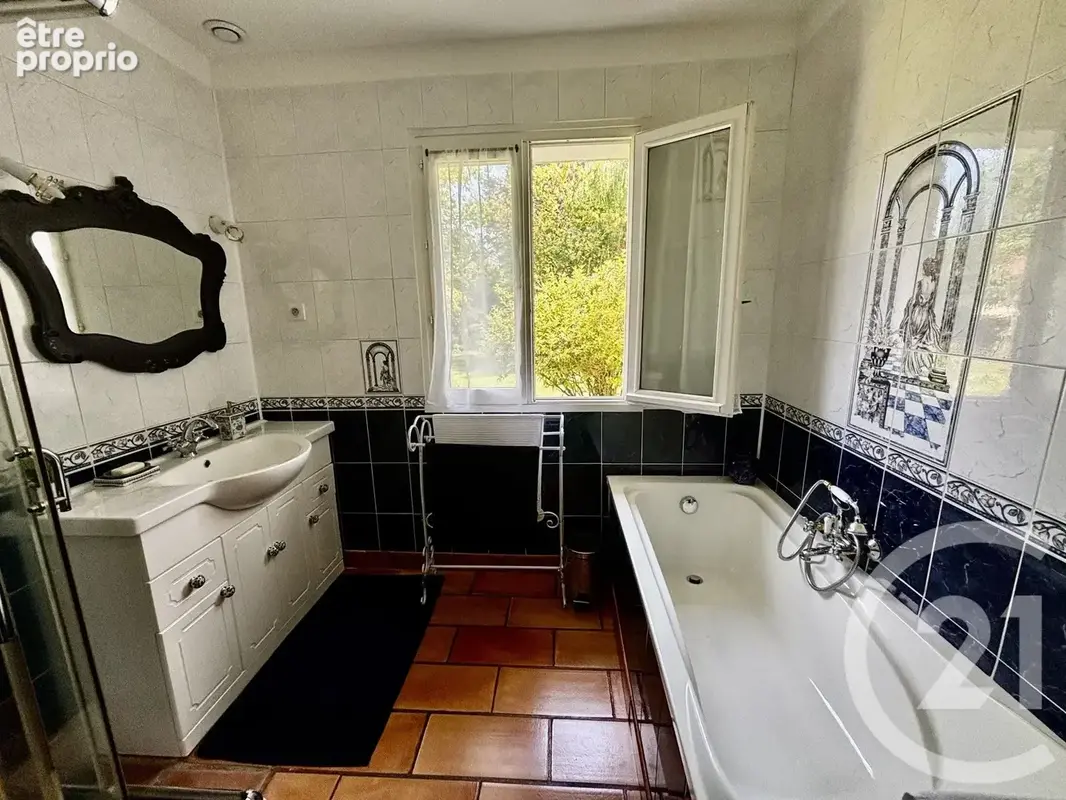 Maison 5 pièces 140 m² à vendre à Garennes-Sur-Eure (27780) - photo 8