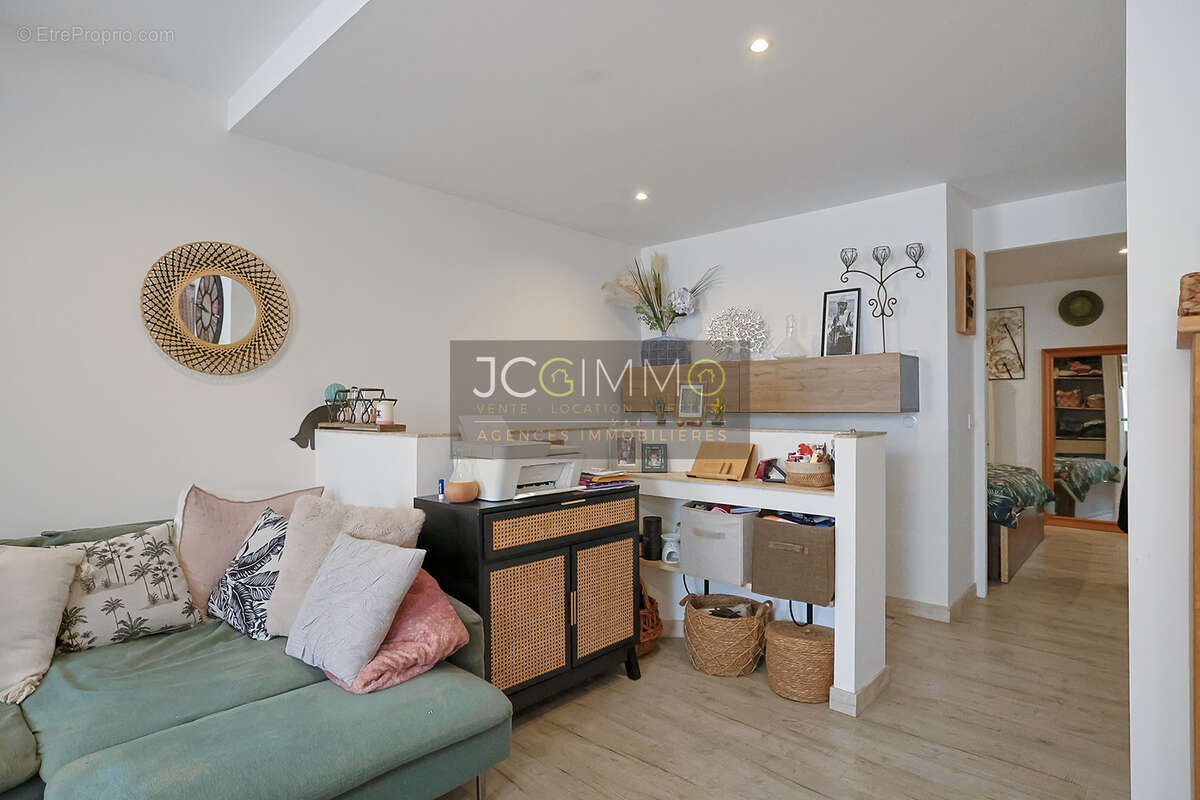 Appartement en rez-de-chaussée 52m2  (T2 + Cave) - photo 5