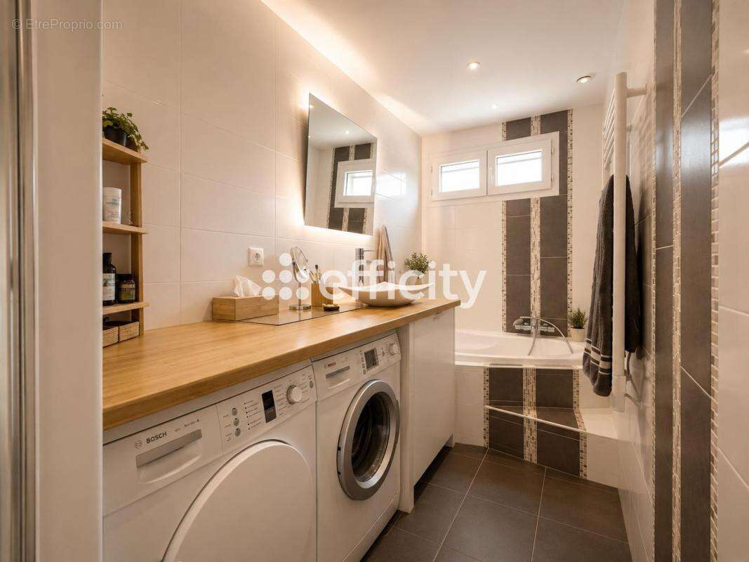 Maison 106 m² à Igny  - photo 11