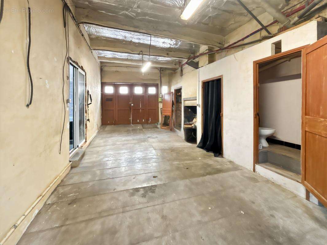 Maison de village rénovée avec grand garage de 100 m² - photo 12