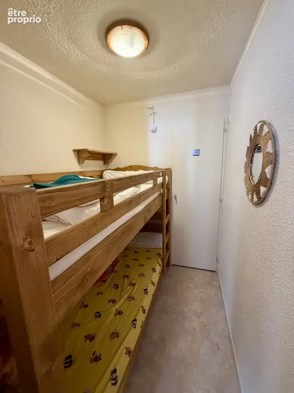 Dans une résidence au pied des pistes de ski et des commerces, venez découvrir ce bel appartement de 34m2, - photo 10