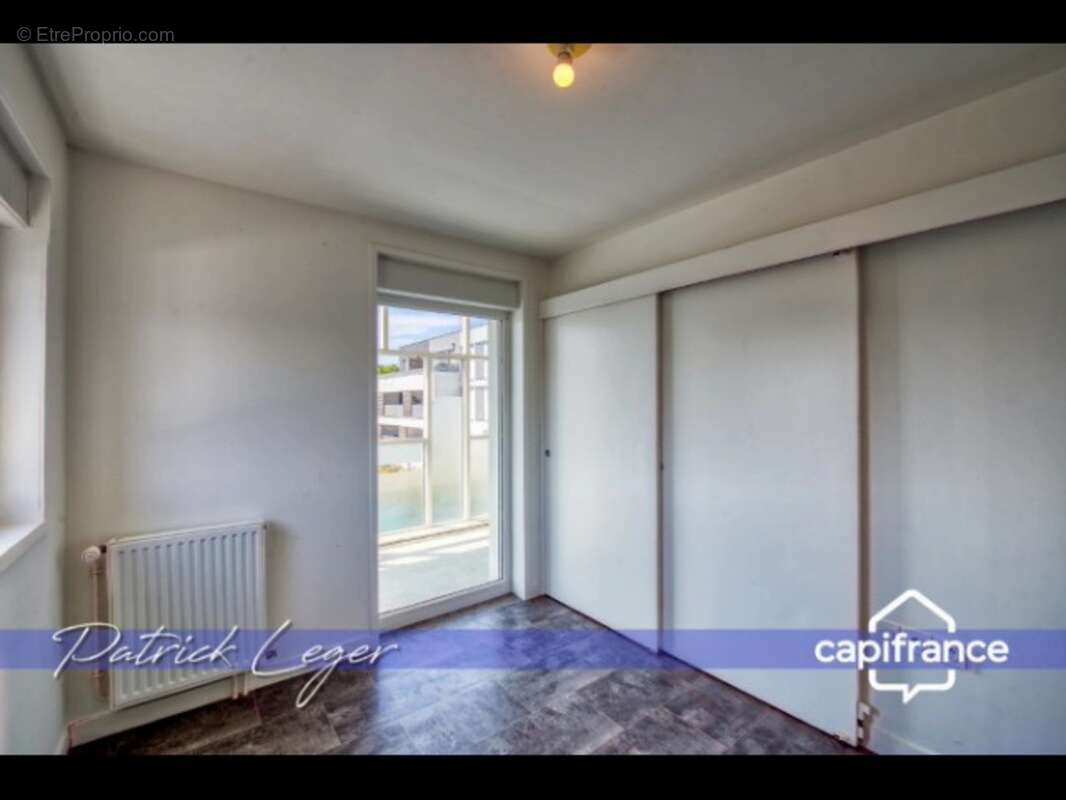 PÉRIGNY (17) – Élégant T3 modulable avec grande terrasse couverte & parking sous-sol - photo 11