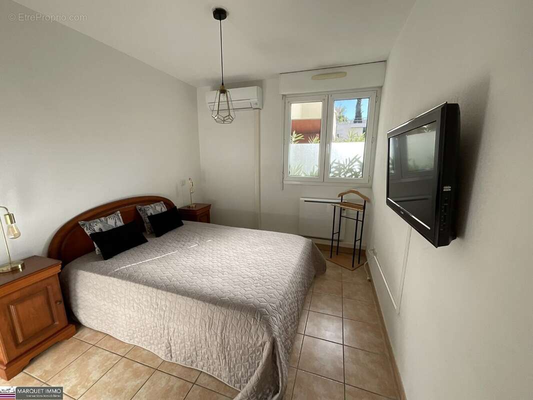Agréable appartement T3 offrant 51 m² avec terrasse de 6 m² en rez-de-jardin d'une résidence sécurisé avec des espaces verts des - photo 5