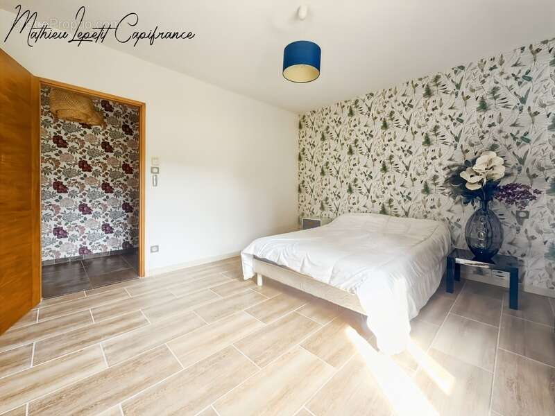 À vendre Maison T9 familiale contemporaine de 313 m² – Construction traditionnelle de 2011 – 7 chambres – Terrain clos de 2 874  - photo 6